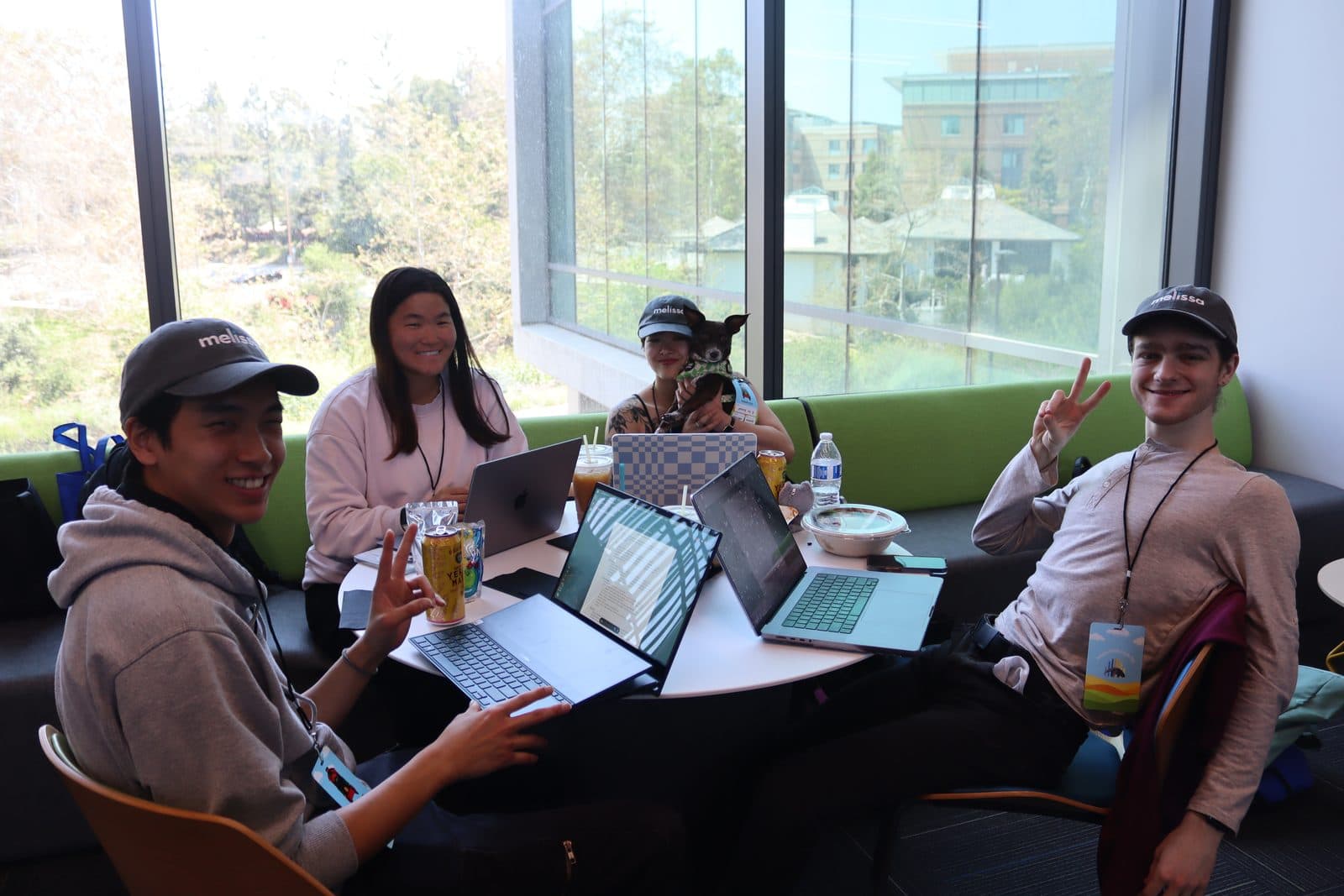 Members working together at a table